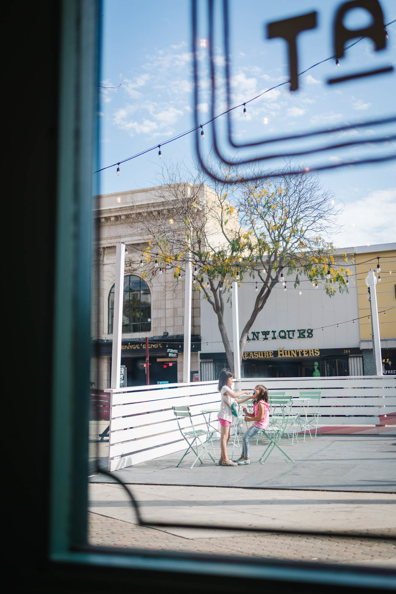 People talking in cafe window